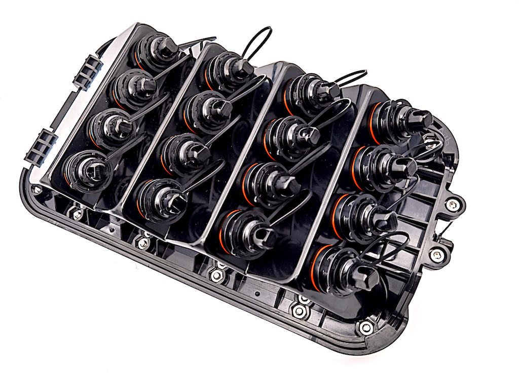 CX-MST-17/18 multiport fiber access terminal with capped connection ports.